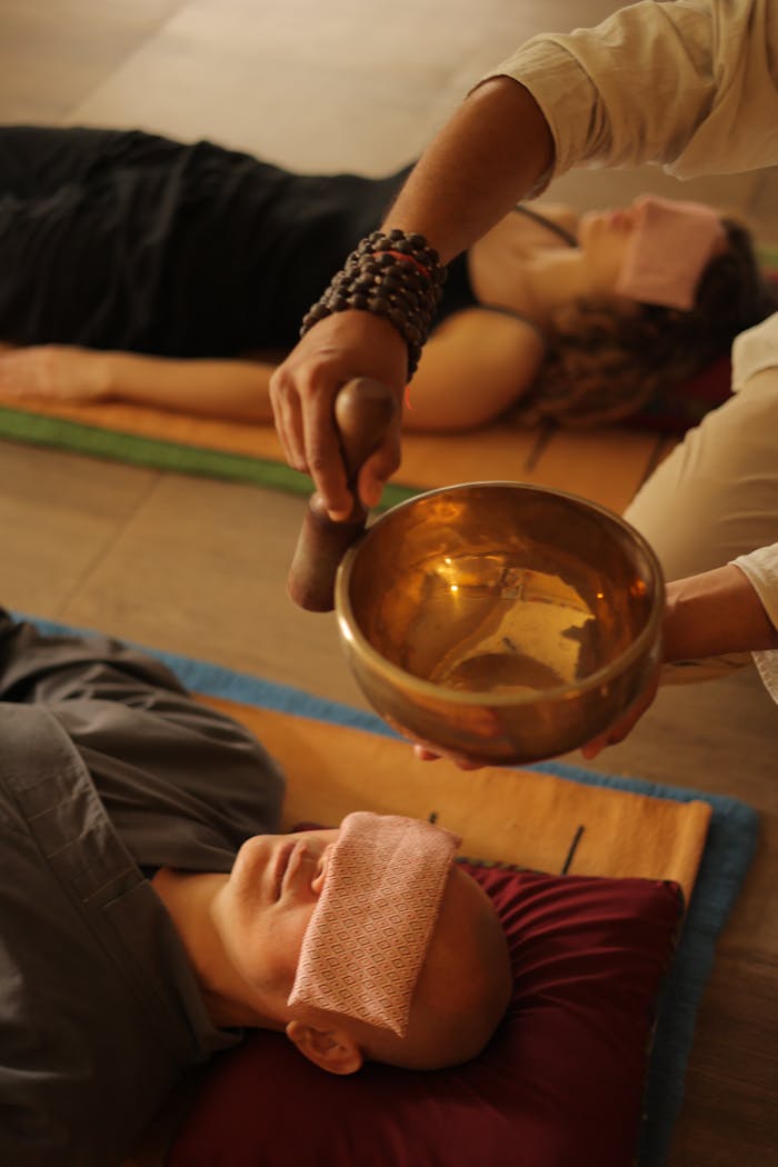 Peaceful meditation session using a singing bowl for sound therapy.